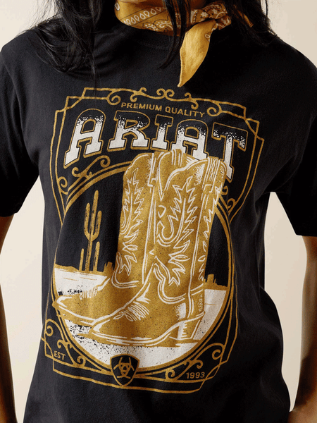 Ariat 10063756 Womens Boot Cloche T-Shirt Black front close up view. If you need any assistance with this item or the purchase of this item please call us at five six one seven four eight eight eight zero one Monday through Saturday 10:00a.m EST to 8:00 p.m EST