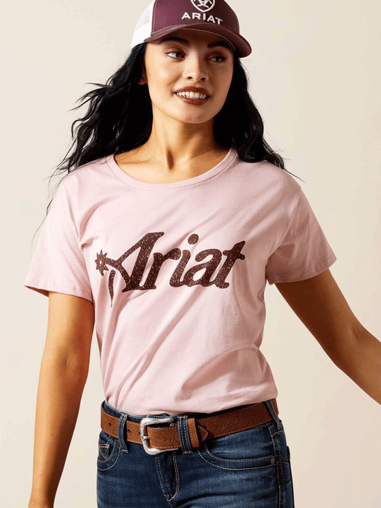 Ariat 10063761 Womens Spur Script T-Shirt Dusty Pink front view. If you need any assistance with this item or the purchase of this item please call us at five six one seven four eight eight eight zero one Monday through Saturday 10:00a.m EST to 8:00 p.m EST
