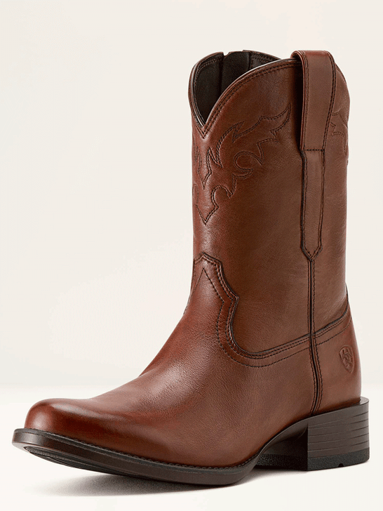 Ariat 10063982 Mens Sonoro Roper Toe Western Boot Cinnamon Brown font and side view. If you need any assistance with this item or the purchase of this item please call us at five six one seven four eight eight eight zero one Monday through Saturday 10:00a.m EST to 8:00 p.m EST