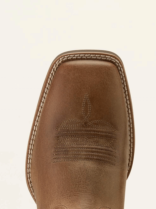 Ariat 10064053 Mens Sport Steer Skull Wide Square Toe Cowboy Boot Sandstorm Bitter Chocolate toe view. If you need any assistance with this item or the purchase of this item please call us at five six one seven four eight eight eight zero one Monday through Saturday 10:00a.m EST to 8:00 p.m EST