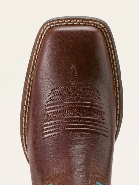 Ariat 10064073 Womens Round Up Filly Wide Square Toe Western Boot Oiled Teak Loyal Blue toe view. If you need any assistance with this item or the purchase of this item please call us at five six one seven four eight eight eight zero one Monday through Saturday 10:00a.m EST to 8:00 p.m EST