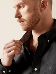 Ariat 10065843 Mens Wrinkle Free Solid Pinpoint Oxford Classic Fit Shirt Black collar close up. If you need any assistance with this item or the purchase of this item please call us at five six one seven four eight eight eight zero one Monday through Saturday 10:00a.m EST to 8:00 p.m EST
