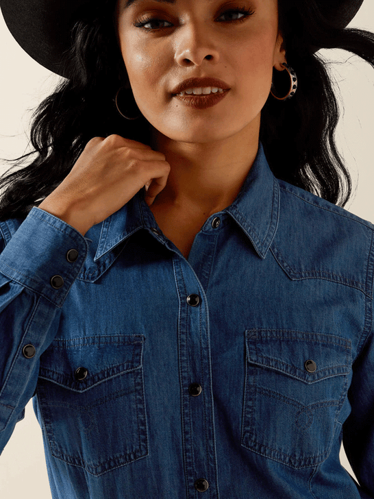 Ariat 10065864 Womens True Blue Shirt Vintage Indigo front close up. If you need any assistance with this item or the purchase of this item please call us at five six one seven four eight eight eight zero one Monday through Saturday 10:00a.m EST to 8:00 p.m EST