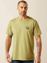 Ariat 10065894 Mens Rattler Warning T-Shirt Tent Green front view. If you need any assistance with this item or the purchase of this item please call us at five six one seven four eight eight eight zero one Monday through Saturday 10:00a.m EST to 8:00 p.m EST