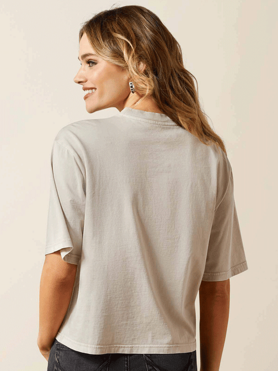 Ariat 10065976 Womens Lucky T-Shirt Washed Beige back view. If you need any assistance with this item or the purchase of this item please call us at five six one seven four eight eight eight zero one Monday through Saturday 10:00a.m EST to 8:00 p.m EST
