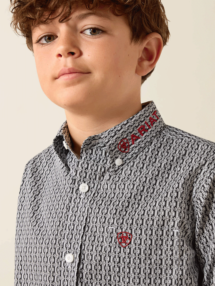 Ariat 10071689 Youth Team Ward Long Sleeve Shirt Black front view. If you need any assistance with this item or the purchase of this item please call us at five six one seven four eight eight eight zero one Monday through Saturday 10:00a.m EST to 8:00 p.m EST
