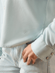Ariat 10071774 Womens Asheville Snap Shirt Light Blue close up. If you need any assistance with this item or the purchase of this item please call us at five six one seven four eight eight eight zero one Monday through Saturday 10:00a.m EST to 8:00 p.m EST