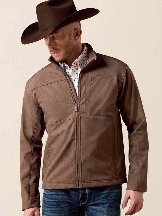 Ariat 10079404 Mens Vernon Softshell Jacket Brown front view zipped. If you need any assistance with this item or the purchase of this item please call us at five six one seven four eight eight eight zero one Monday through Saturday 10:00a.m EST to 8:00 p.m EST
