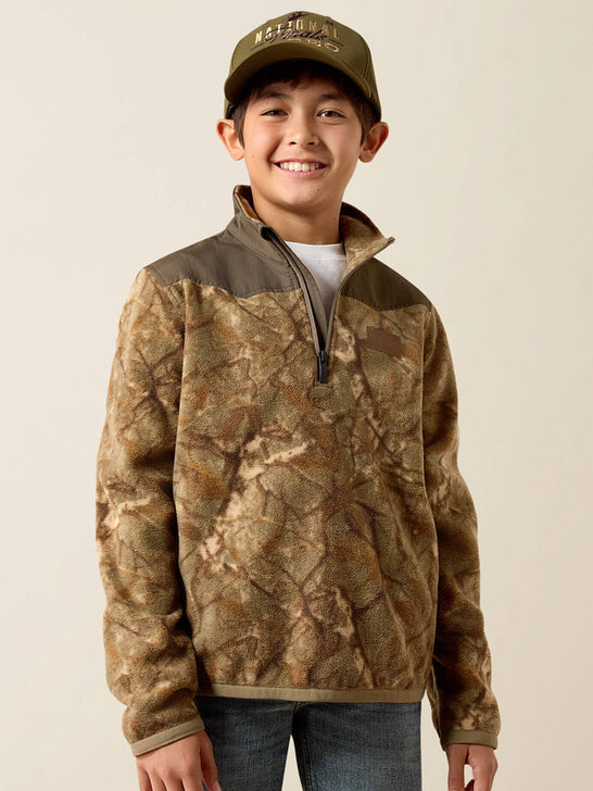 Ariat 10079433 Kids Basis Fleece Pullover Savannah Tan Camo front view. If you need any assistance with this item or the purchase of this item please call us at five six one seven four eight eight eight zero one Monday through Saturday 10:00a.m EST to 8:00 p.m EST
