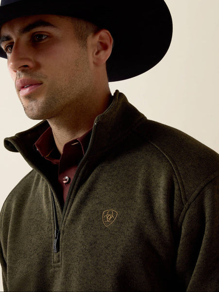 Ariat 10079650 Mens Caldwell Logo 1/4 Zip Sweater Dark Green front close up. If you need any assistance with this item or the purchase of this item please call us at five six one seven four eight eight eight zero one Monday through Saturday 10:00a.m EST to 8:00 p.m EST