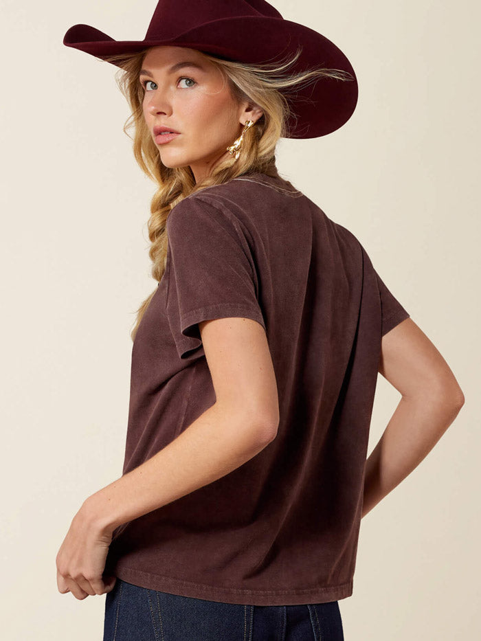 Ariat 10079672 Womens Rebel With A Cause T-Shirt Dark Brown front view.If you need any assistance with this item or the purchase of this item please call us at five six one seven four eight eight eight zero one Monday through Saturday 10:00a.m EST to 8:00 p.m EST
