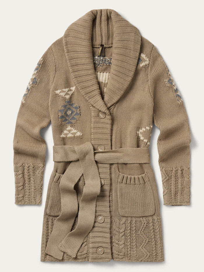 A woman wearing a beige knit shawl collar cardigan with a tie belt, decorative embroidered patterns, and front pockets, styled with a light beige cowboy hat, a gray top, and blue jeans against a solid light gray background. If you need any assistance with this item or the purchase of this item please call us at five six one seven four eight eight eight zero one Monday through Saturday 10:00a.m EST to 8:00 p.m EST