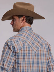 A man shown from the back wearing a tan cowboy hat and a blue, white, and brown plaid western shirt against a plain light gray background. If you need any assistance with this item or the purchase of this item please call us at five six one seven four eight eight eight zero one Monday through Saturday 10:00a.m EST to 8:00 p.m EST
