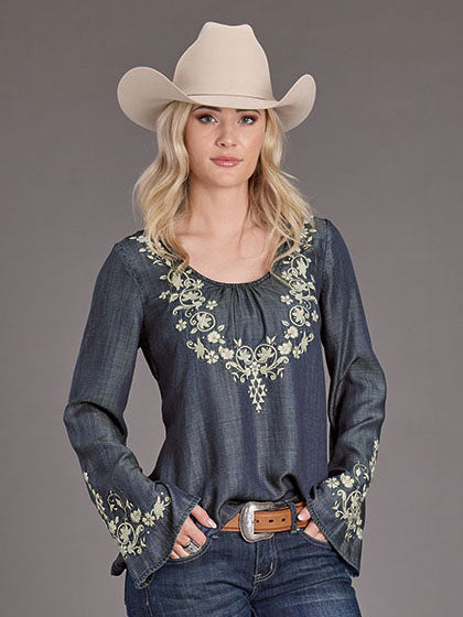 Stetson 11-050-0565-2042 Womens Embroidered Peasant Blouse Denim front view on model.If you need any assistance with this item or the purchase of this item please call us at five six one seven four eight eight eight zero one Monday through Saturday 10:00a.m EST to 8:00 p.m EST
