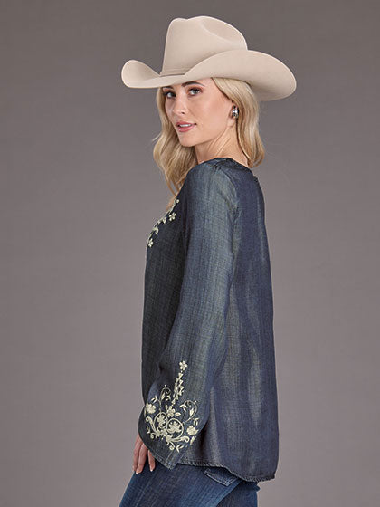 Stetson 11-050-0565-2042 Womens Embroidered Peasant Blouse Denim side view on model. If you need any assistance with this item or the purchase of this item please call us at five six one seven four eight eight eight zero one Monday through Saturday 10:00a.m EST to 8:00 p.m EST
