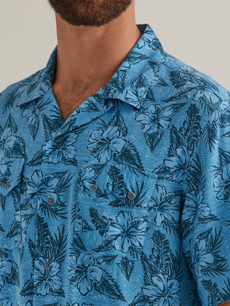 Wrangler 112344429 Mens Coconut Cowboy Short Sleeve Shirt Blue front close up view. If you need any assistance with this item or the purchase of this item please call us at five six one seven four eight eight eight zero one Monday through Saturday 10:00a.m EST to 8:00 p.m EST