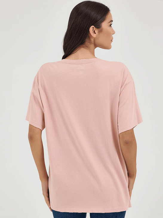 Wrangler 112361044 Womens Lainey Wilson Oversized Band Tee Misty Rose back view. If you need any assistance with this item or the purchase of this item please call us at five six one seven four eight eight eight zero one Monday through Saturday 10:00a.m EST to 8:00 p.m EST
