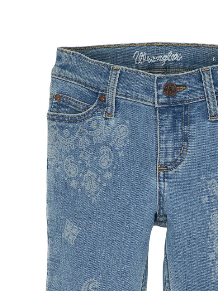 Wrangler 112361274 Girls Western Flare Slim Jean Light Blue front view. If you need any assistance with this item or the purchase of this item please call us at five six one seven four eight eight eight zero one Monday through Saturday 10:00a.m EST to 8:00 p.m EST