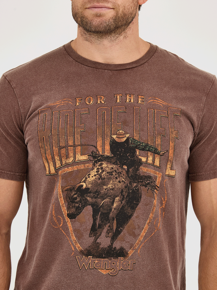 Wrangler 112361859 Mens For The Ride Of Life Graphic T-Shirt Potting Soil Brown front view. If you need any assistance with this item or the purchase of this item please call us at five six one seven four eight eight eight zero one Monday through Saturday 10:00a.m EST to 8:00 p.m EST

