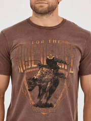 Wrangler 112361859 Mens For The Ride Of Life Graphic T-Shirt Potting Soil Brown front graphic close up. If you need any assistance with this item or the purchase of this item please call us at five six one seven four eight eight eight zero one Monday through Saturday 10:00a.m EST to 8:00 p.m EST

