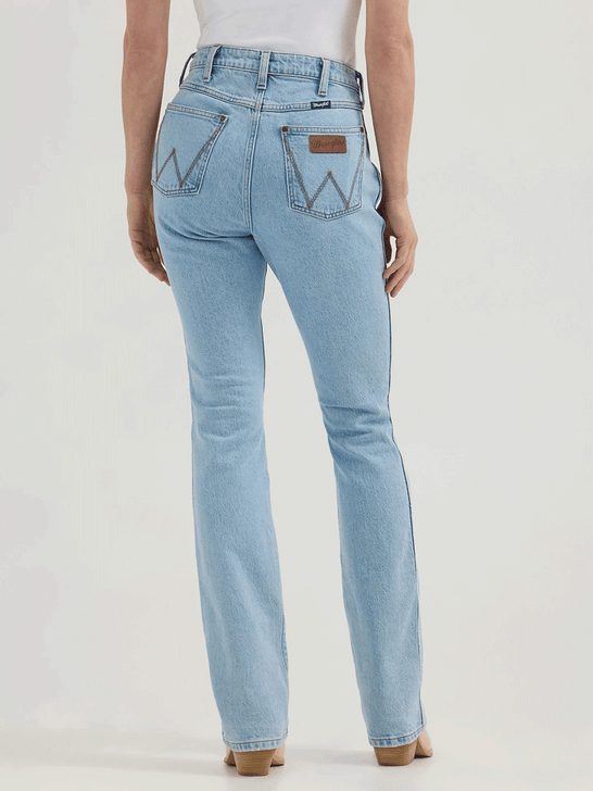 Wrangler 112364570 Womens Retro Bailey High Rise Bootcut Jean Lila back view. If you need any assistance with this item or the purchase of this item please call us at five six one seven four eight eight eight zero one Monday through Saturday 10:00a.m EST to 8:00 p.m EST