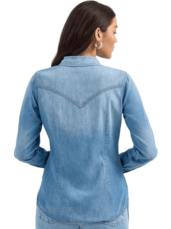 Wrangler 112367313 Womens Classic Denim Western Snap Shirt Blue back view. If you need any assistance with this item or the purchase of this item please call us at five six one seven four eight eight eight zero one Monday through Saturday 10:00a.m EST to 8:00 p.m EST