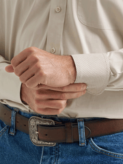 Wrangler 112369608 Mens George Strait Collection Long Sleeve Shirt Pale Stone cuff close up. If you need any assistance with this item or the purchase of this item please call us at five six one seven four eight eight eight zero one Monday through Saturday 10:00a.m EST to 8:00 p.m EST