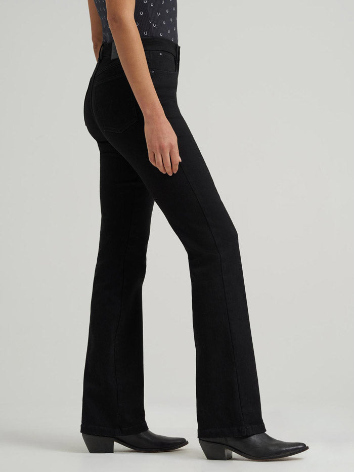 Wrangler 112371949 Womens BESPOKE High Rise Bootcut Jean Leighton Black front view. If you need any assistance with this item or the purchase of this item please call us at five six one seven four eight eight eight zero one Monday through Saturday 10:00a.m EST to 8:00 p.m EST
