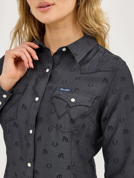 Wrangler 112372429 Ladies All Occasion Western Snap Shirt Subtle Black Horses front close up. If you need any assistance with this item or the purchase of this item please call us at five six one seven four eight eight eight zero one Monday through Saturday 10:00a.m EST to 8:00 p.m EST