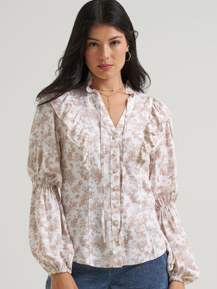 Wrangler 112382881 Womens X Lainey Wilson Snap Ruffle Blouse Natural front view. If you need any assistance with this item or the purchase of this item please call us at five six one seven four eight eight eight zero one Monday through Saturday 10:00a.m EST to 8:00 p.m EST
