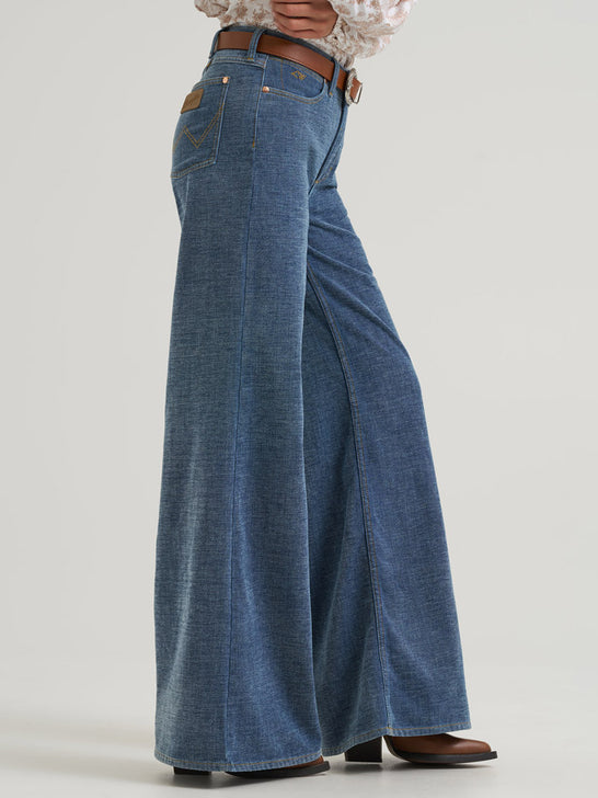 Wrangler 112382902 Womens X Lainey Wilson Cheeky Wide Leg Jean Chenille side view. If you need any assistance with this item or the purchase of this item please call us at five six one seven four eight eight eight zero one Monday through Saturday 10:00a.m EST to 8:00 p.m EST