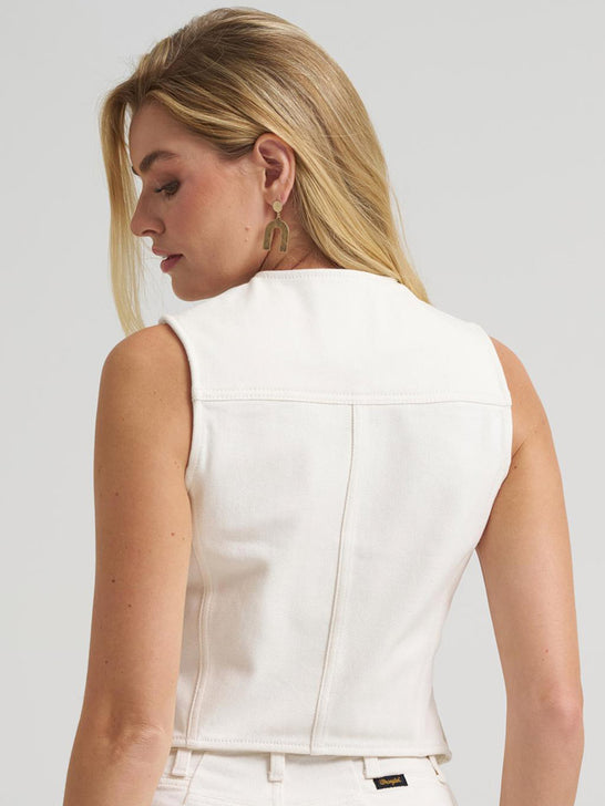 Wrangler 112385569 Womens Lainey Wilson X Iconic Denim Vest Pearl White back view. If you need any assistance with this item or the purchase of this item please call us at five six one seven four eight eight eight zero one Monday through Saturday 10:00a.m EST to 8:00 p.m EST
