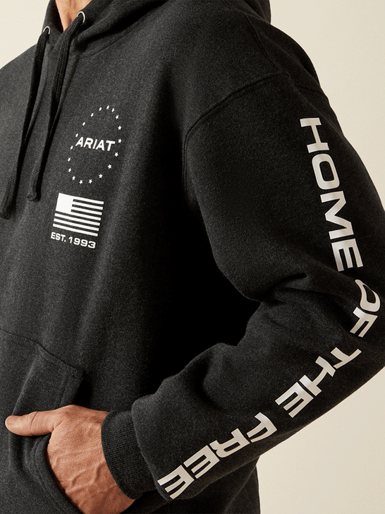 Ariat 10062496 Mens Sponsor Patriot Hoodie Charcoal Heather left side close up. If you need any assistance with this item or the purchase of this item please call us at five six one seven four eight eight eight zero one Monday through Saturday 10:00a.m EST to 8:00 p.m EST