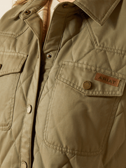 Ariat 10062813 Womens Grizzly Quilted Barn Jacket Dusky Green front close up. If you need any assistance with this item or the purchase of this item please call us at five six one seven four eight eight eight zero one Monday through Saturday 10:00a.m EST to 8:00 p.m EST