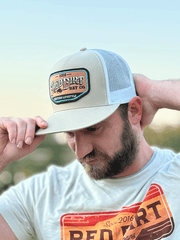 Red Dirt RDHC-484 LIFESTYLE Trucker Cap White Khaki on model. If you need any assistance with this item or the purchase of this item please call us at five six one seven four eight eight eight zero one Monday through Saturday 10:00a.m EST to 8:00 p.m EST