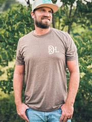 Red Dirt RDHC-T-185 Mens Tooled Leather Tee Black Brown front view. If you need any assistance with this item or the purchase of this item please call us at five six one seven four eight eight eight zero one Monday through Saturday 10:00a.m EST to 8:00 p.m EST