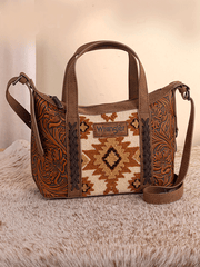 Wrangler WG226-8605BR Womens Tooled Aztec Pattern Print Crossbody Brown front view. If you need any assistance with this item or the purchase of this item please call us at five six one seven four eight eight eight zero one Monday through Saturday 10:00a.m EST to 8:00 p.m EST