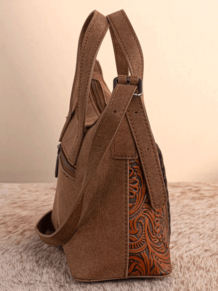 Wrangler WG226-8605BR Womens Tooled Aztec Pattern Print Crossbody Brown side view. If you need any assistance with this item or the purchase of this item please call us at five six one seven four eight eight eight zero one Monday through Saturday 10:00a.m EST to 8:00 p.m EST