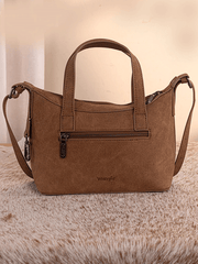 Wrangler WG226-8605BR Womens Tooled Aztec Pattern Print Crossbody Brown back view. If you need any assistance with this item or the purchase of this item please call us at five six one seven four eight eight eight zero one Monday through Saturday 10:00a.m EST to 8:00 p.m EST