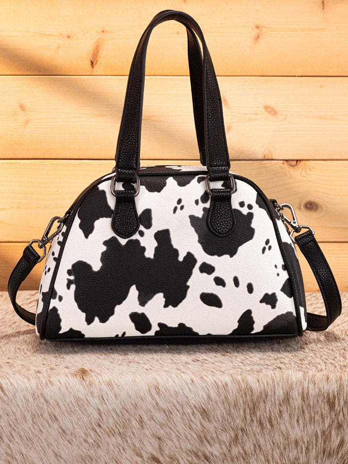 Wrangler WG399-5112BKCOW Womens Cow Print Satchel/Crossbody Bag Black front view. If you need any assistance with this item or the purchase of this item please call us at five six one seven four eight eight eight zero one Monday through Saturday 10:00a.m EST to 8:00 p.m EST