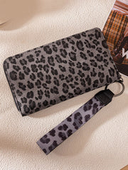 Wrangler WG366-W006BK Womens Leopard Print Wallet/Wristlet Bag Black back view. If you need any assistance with this item or the purchase of this item please call us at five six one seven four eight eight eight zero one Monday through Saturday 10:00a.m EST to 8:00 p.m EST