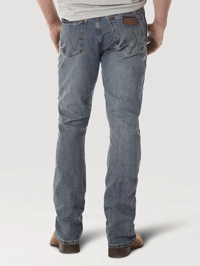 Wrangler 77MWZGL Mens Retro Slim Bootcut Jeans Greeley front view. If you need any assistance with this item or the purchase of this item please call us at five six one seven four eight eight eight zero one Monday through Saturday 10:00a.m EST to 8:00 p.m EST