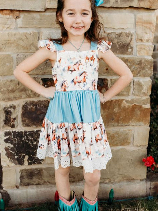 Shea Baby SDR53 Infants Running Horse Ruffle Dress Light Blue front view on model. If you need any assistance with this item or the purchase of this item please call us at five six one seven four eight eight eight zero one Monday through Saturday 10:00a.m EST to 8:00 p.m EST
