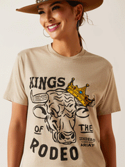 Ariat 10047841 Unisex Sendero King Cow T-Shirt Oatmeal Heather front view on female model. If you need any assistance with this item or the purchase of this item please call us at five six one seven four eight eight eight zero one Monday through Saturday 10:00a.m EST to 8:00 p.m EST