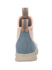 A single mid-top athletic shoe shown from the rear, featuring a dusty blue heel counter, a light pink collar, a beige pull tab, and a beige outsole, on a solid white background. If you need any assistance with this item or the purchase of this item please call us at five six one seven four eight eight eight zero one Monday through Saturday 10:00a.m EST to 8:00 p.m EST