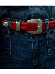 Stetson 9409790 Womens Croco Print Tapered Belt Red on model. If you need any assistance with this item or the purchase of this item please call us at five six one seven four eight eight eight zero one Monday through Saturday 10:00a.m EST to 8:00 p.m EST