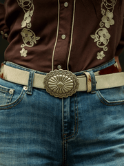Stetson 9411790 Womens Hair-On-Hide Southwestern Buckle Belt Brown front view on model. If you need any assistance with this item or the purchase of this item please call us at five six one seven four eight eight eight zero one Monday through Saturday 10:00a.m EST to 8:00 p.m EST