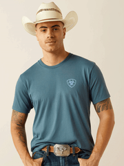 Ariat 10058897 Mens Puebla Serape T-Shirt Lagoon Green front view. If you need any assistance with this item or the purchase of this item please call us at five six one seven four eight eight eight zero one Monday through Saturday 10:00a.m EST to 8:00 p.m EST
