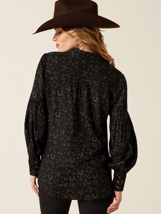 Ariat 10053979 Womens Blinged Out Top Golden Horseshoes Print Black back. If you need any assistance with this item or the purchase of this item please call us at five six one seven four eight eight eight zero one Monday through Saturday 10:00a.m EST to 8:00 p.m EST