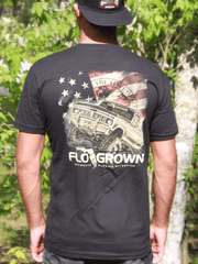 FloGrown FGM-1298 Mens Short Sleeve USA Mud Truck Tee Black back view on model. If you need any assistance with this item or the purchase of this item please call us at five six one seven four eight eight eight zero one Monday through Saturday 10:00a.m EST to 8:00 p.m EST